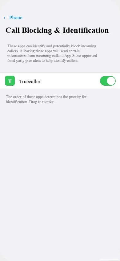 Call Blocking and Identification settings on iPhone with Truecaller app toggle enabled for spam filtering