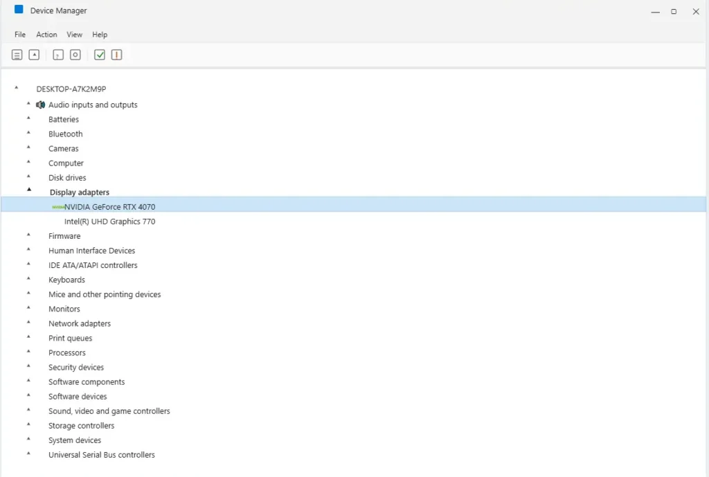 Device Manager window showing the expanded Display adapters category with a graphics card name like NVIDIA or Intel listed
