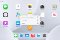 delete-app-ipad-home-screen-menu iPad Home Screen showing long-press context menu with Delete App and Remove from Home Screen options visible