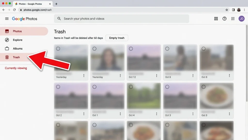 Google Photos web interface at photos.google.com showing the left sidebar navigation with the Trash folder highlighted for recovering deleted photos from broken Android