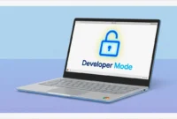 Illustration of a Chromebook laptop displaying a developer mode unlock icon representing how to enable Chrome OS developer mode