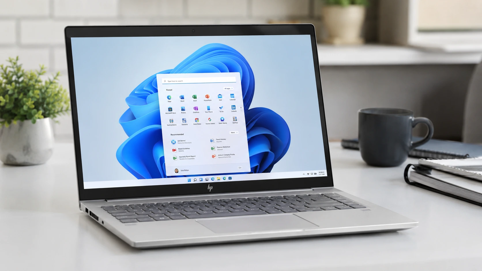 HP laptop on desk displaying Windows interface for factory reset guide